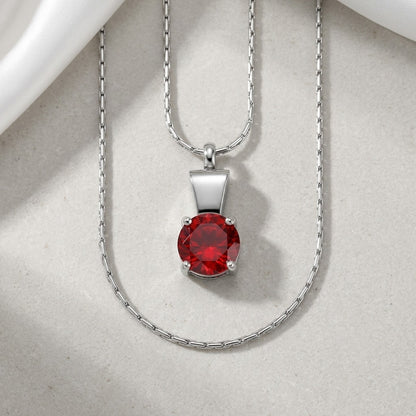 Aramat Jewels zilverkleurige RVS ashanger met rode zirkonia, 28x12mm, waterbestendig gedenksieraad.