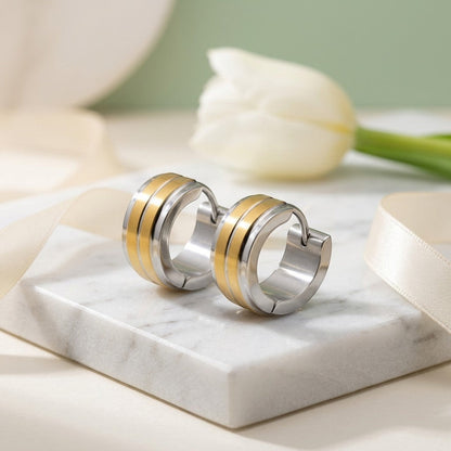 Aramat Jewels stainless steel bicolor huggie hoop earrings with double gold stripes, 13mm diameter.