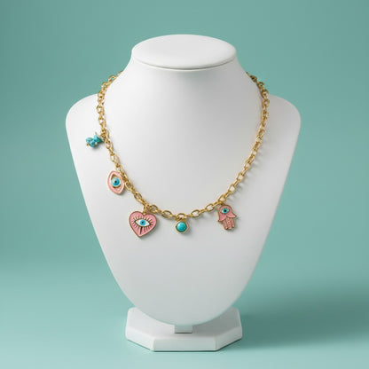 Aramat Jewels gold-tone stainless steel chain necklace with enamel hamsa hand, evil eye, heart, and turquoise charms.