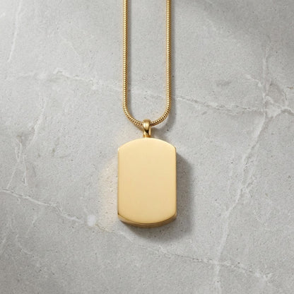 Aramat Jewels® gouden rechthoekige ashanger van staal, waterbestendig en geschikt voor dagelijks gebruik. Zonder ketting.