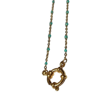 Aramat Jewels gold-tone stainless steel necklace with small green enamel beads and a circular clasp.