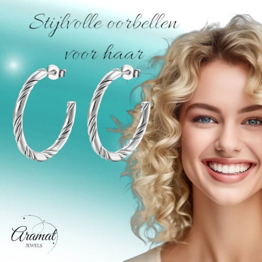 Aramat Jewels zilverkleurige halve twisted hoepel oorbellen van RVS met een gedraaid design van 30mm diameter.