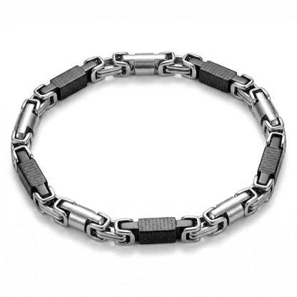 Aramat Jewels stoere koningsschakel armband van edelstaal met zwarte accenten en karabijnslot, 6mm breed en 23cm lang.