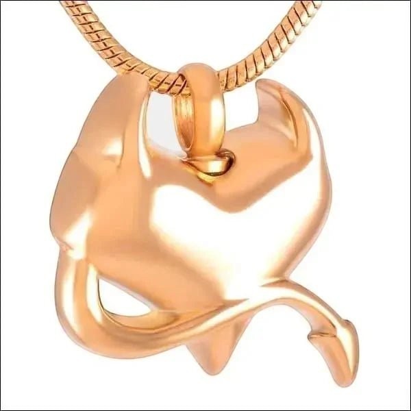 Aramat Jewels rose gold stainless steel heart pendant with devil motif and screw closure. Unique memorial jewelry.
