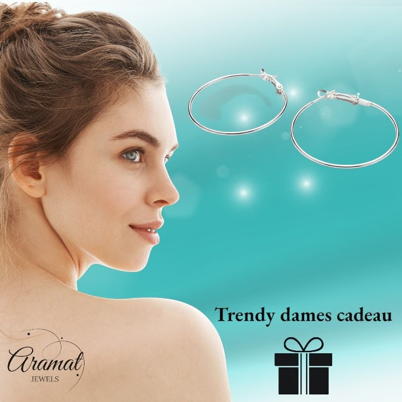 Aramat Jewels silver-tone metal hoop earrings, 40mm diameter, lightweight with a click-top clasp, perfect for everyday wear.