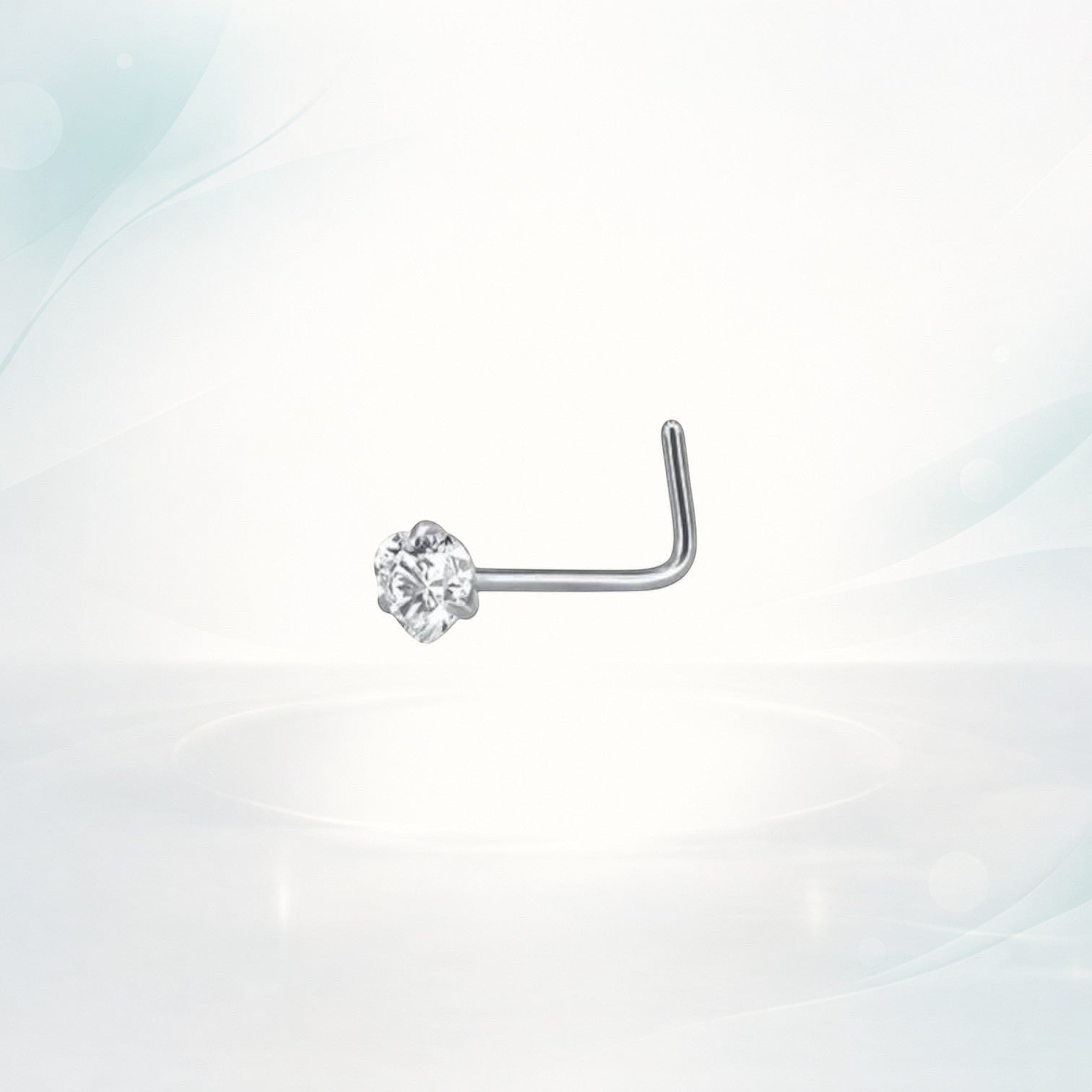 Aramat Jewels silver steel nose piercing with a clear cubic zirconia stone.