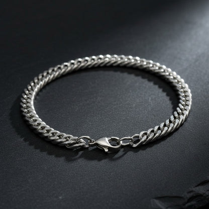Aramat Jewels zilverkleurige dubbele gourmet schakelarmband van 316L roestvrij staal met een karabijnsluiting.