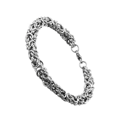 Aramat Jewels stalen koningsarmband met byzantijnse schakel, 7mm breed en 20cm lang, zilverkleurig.