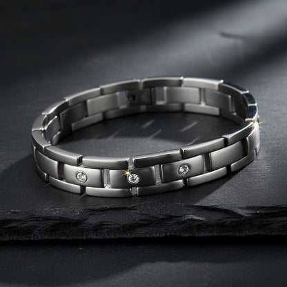 Aramat Jewels zilverkleurige schakelarmband van 316L staal met transparante zirkonia steentjes voor dames en heren.