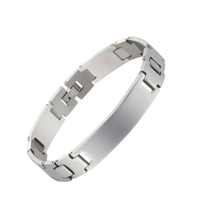 Aramat Jewels zilverkleurige stalen plaatarmband van 12mm breed met een stoere fantasieschakel en stevige sluiting.