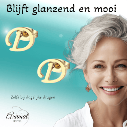 Goudkleurige RVS oorstekers Letter D - Aramat Jewels - Oorbellen - cadeautip
