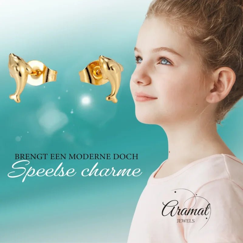 Gouden oorbellen met dolfijn.