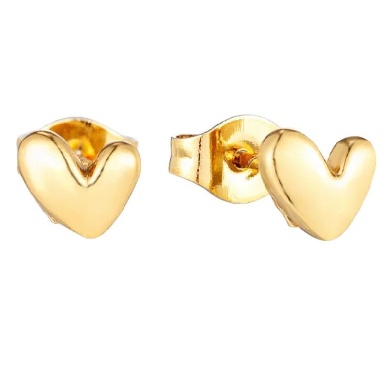 Gouden hartvormige oorbellen.