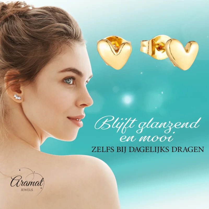 Gouden hart oorbellen.