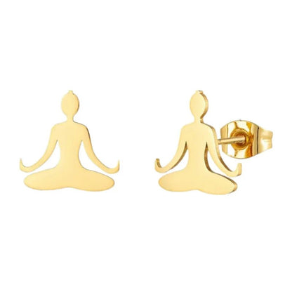 Gouden oorbellen in de vorm van mediterende figuren in lotushouding.