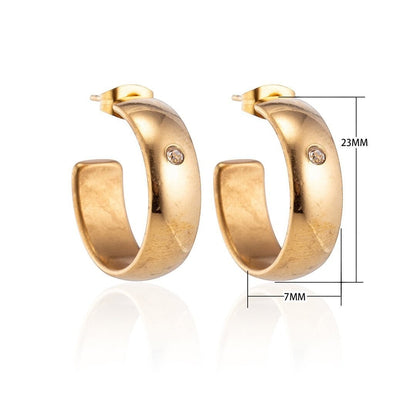 Oorbellen – 23mm Hoepel Creool Zirkonia Accent RVS Goudkleur Unisex - Aramat Jewels - Oorringen - cadeautip