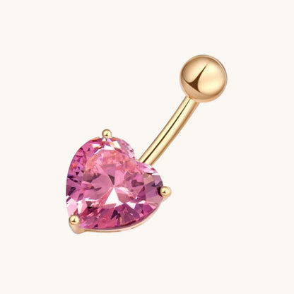 Piercing nombril en forme de cœur rose avec zircone