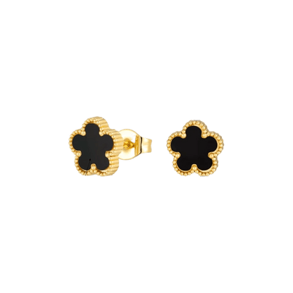 Vergulde bloemvormige oorbellen met een zwart onyx hart.