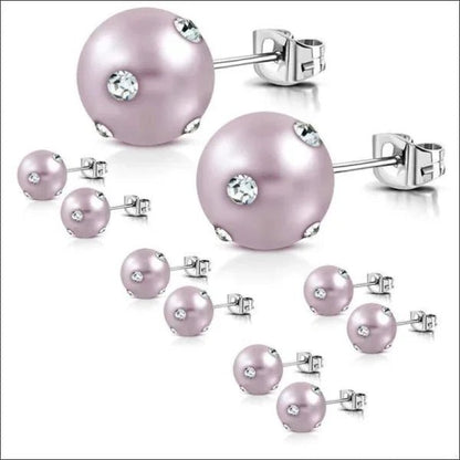 Een set oorbellen met roze parels en diamanten