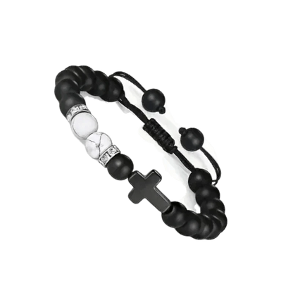 Een zwart-witte armband met een doodshoofd