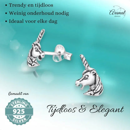 Zilveren eenhoorn oorbellen.