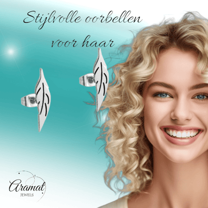 Zilverkleurige blad oorbellen 11×2 mm - oor3206 - Oorbellen kopen# - 11mm - alles - blad