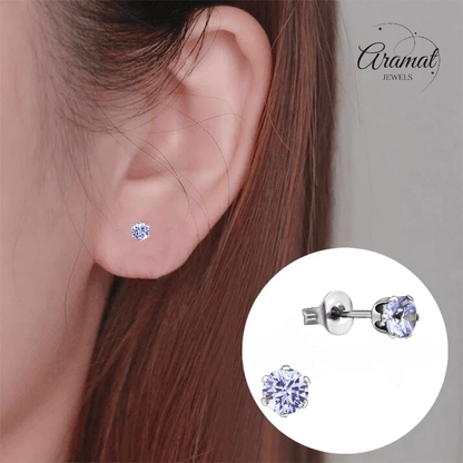 Zilverkleurige Zirkonia Oorbellen 4mm Lila - Aramat Jewels - Oorbellen - cadeautip